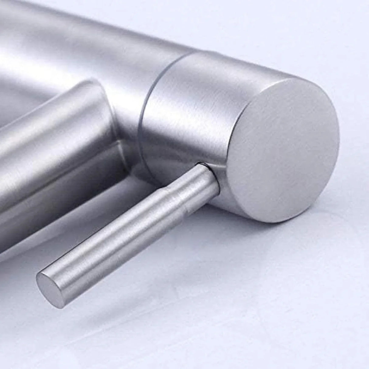 Grifería Llave Lavamanos Baja Satin Agua Fría, Cierre Rapído con Aireador