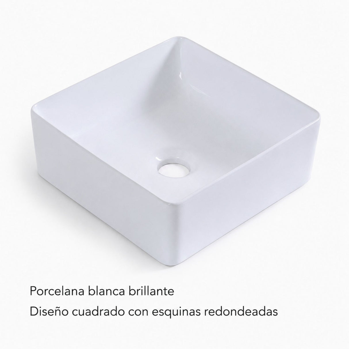 Detalle de porcelana blanca brillante y esquinas redondeadas del lavamanos