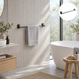 Toallero negro de barra de 60 cm instalado en un baño contemporáneo