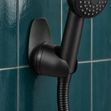 Detalle de soporte ajustable negro para teleducha instalado