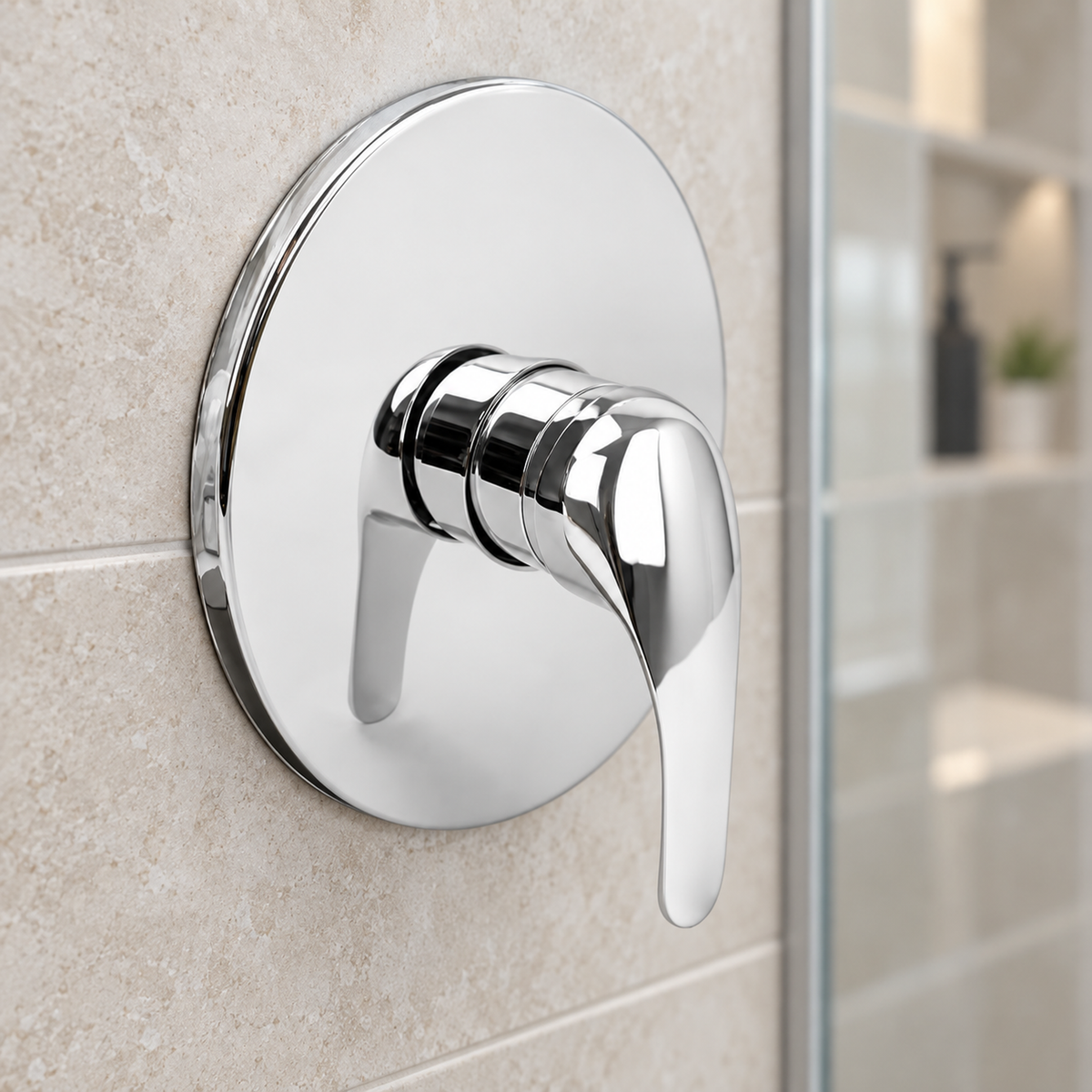 Registro monocontrol para ducha con escudo redondo en acero inoxidable en acercamiento instalado
