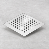 Cabezal de ducha cuadrado Mirage de 15 x 15 cm en vista inferior de tres cuartos