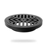 Rejilla De Piso En PVC Negra Con Diseño Radial 4 × 3 cm - producto sobre fondo blanco