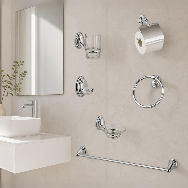 Seis accesorios cromados instalados en una pared de baño