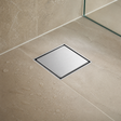 Desagüe de Piso Invisible 10 × 10 cm en Acero Inoxidable 304 en ambiente moderno y bien iluminado