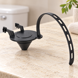 Agua Stop de oreja para tanque sanitario suelto sobre piedra cálida antes de instalar; accesorios del ambiente no incluidos.