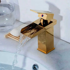 Grifería Lavamanos Baja Cascada Oro Brillante Monocontrol 16 cm con Mezclador Agua Fría y Calient