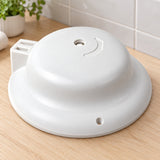 Tapa Blanca con Selector para Ducha Maxi Zent 220 V, repuesto completo sobre mesón de madera en un baño, sin instalar