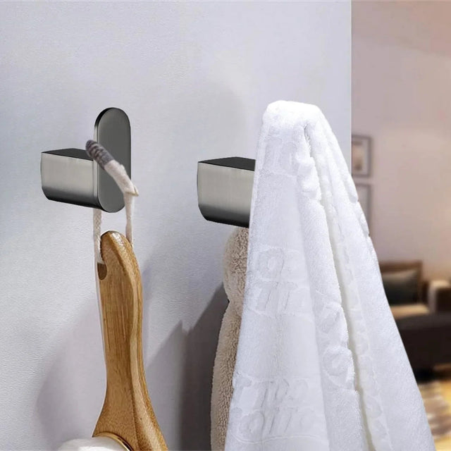 Perchero de pared Kassel gunmetal con toalla y accesorio en baño