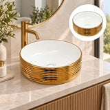 Lavamanos Fiorent Blanco Con Exterior Dorado 39 X 39 X 13 Cm en ambiente de baño, vista amplia