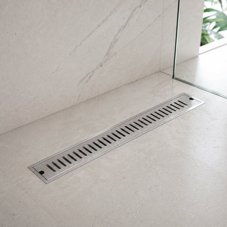 Rejilla lineal de piso en acero 40 x 10 cm instalada
