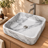 Lavamanos Carrara RS049 en baño con tapa de desagüe ilustrativa