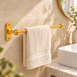 Toallero de barra para baño en aluminio dorado ambientado