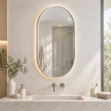 Espejo Aura LED indirecto ovalado 50 × 80 cm cromado antiempañante, ambientado en baño moderno