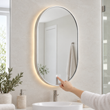 Espejo Aura LED indirecto ovalado 50 × 80 cm cromado antiempañante, uso del control táctil
