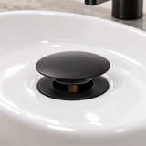 Desagüe Push Negro Para Lavamanos En Bronce - Vista cercana del producto