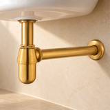 Sifón Tipo Pastilla Brushed Gold En Acero SUS304 - Vista cercana del producto