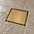Rejilla Invisible Oro Cepillado Para Piso 10 X 10 Cm instalada y funcionando