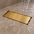 Rejilla Lineal Invisible Oro Cepillado Para Piso 20 X 10 Cm instalada y funcionando