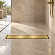 Rejilla invisible Oro cepillado instalada en ducha